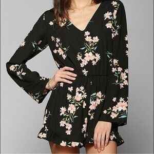 Pins and Needles size m Floral Black v neck romper w ruffle detail leg Anthro